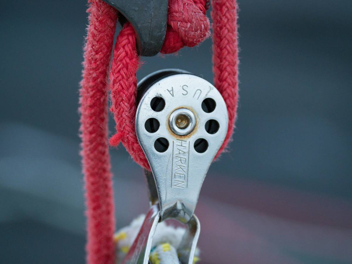 Close-up shot of clean climbing pitons and carabiners