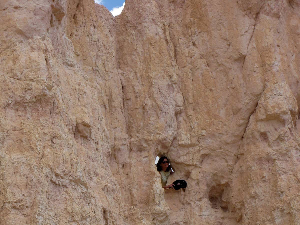 Close-up shot of crampons embedded firmly in thick ice