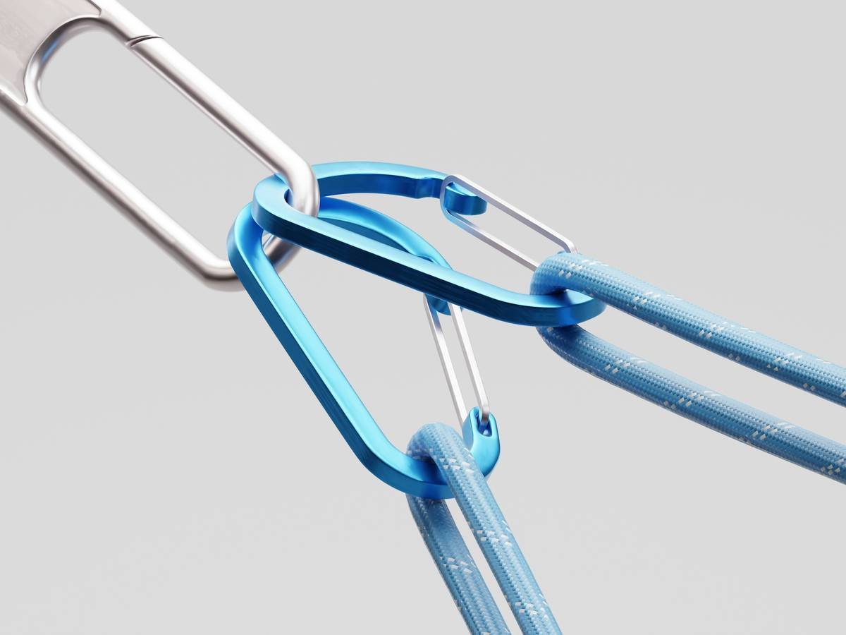 close-up image showing proper placement of a piton on rough terrain